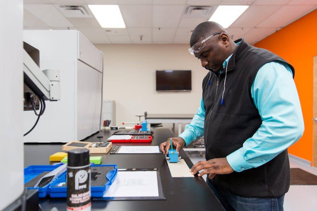 Employee Testing a Product